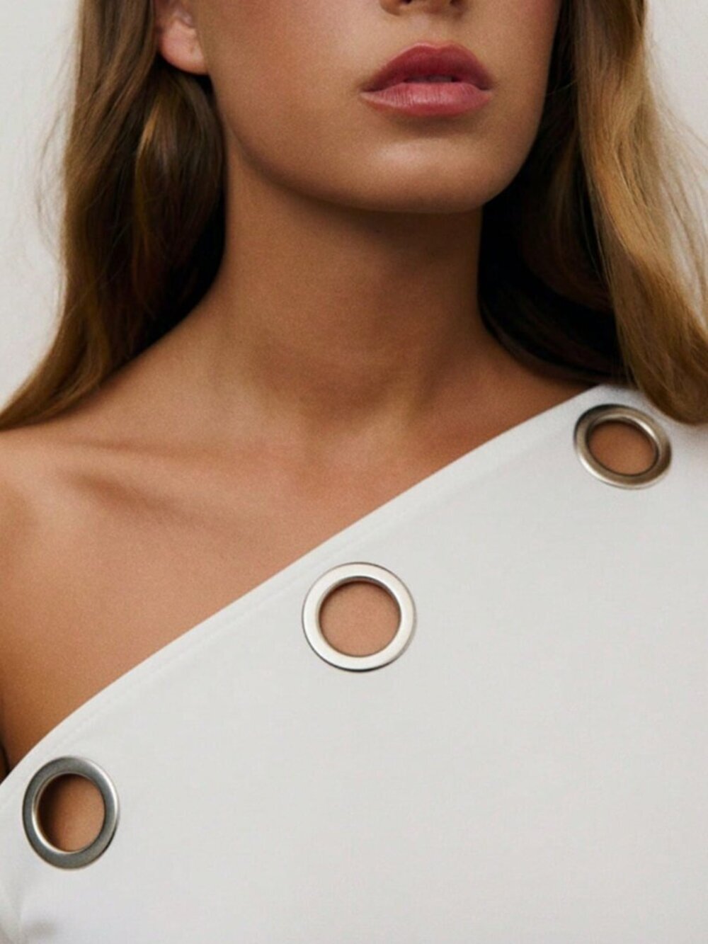 White Casual Women's One-Shoulder Asymmetrical Metal Eyelet Top - Picture 6 of 11